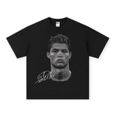 https://cdn.shopify.com/s/files/1/0901/0413/6028/files/ronaldo-tee-654198.webp?v=1743324144